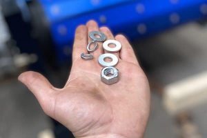 small nuts and washers-crossbelt magnet-Bunting-Newton
