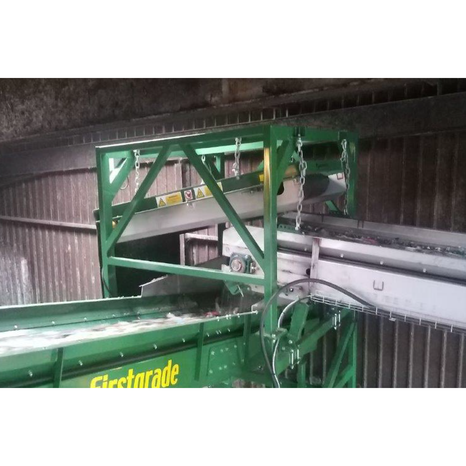 PCB mounted in-line with conveyed material at a recycling plant.