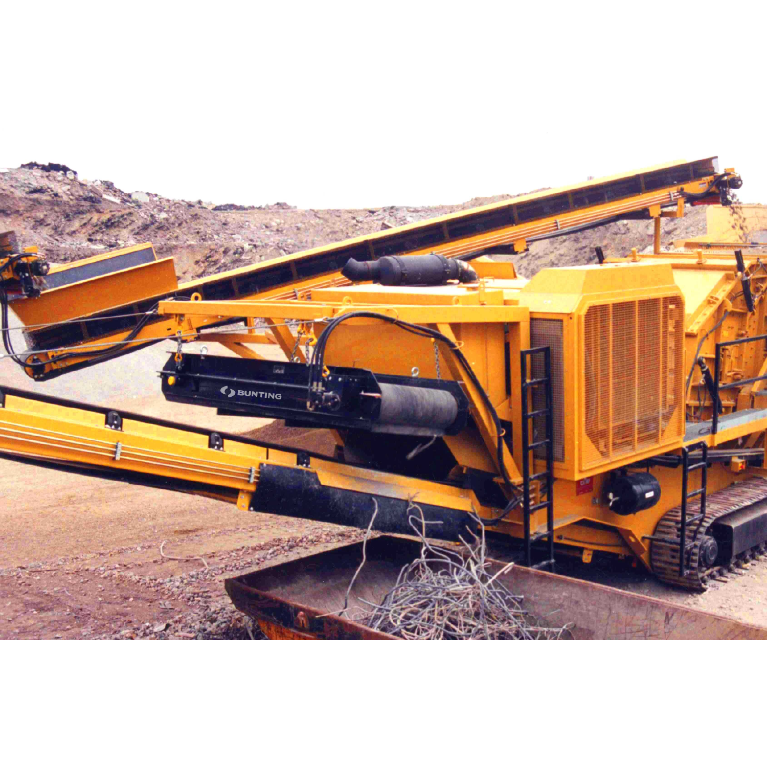PCB permanent overband magnet on a yellow mobile crusher